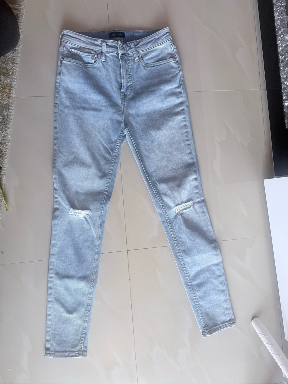 Light Blue Skinny High-Rise Jeans with Knee Rips